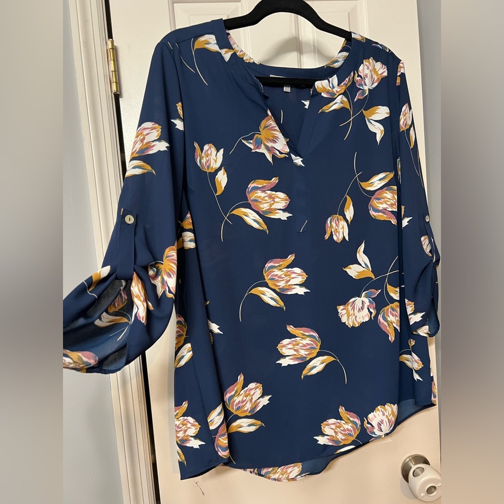 Navy blue flowered bell sleeve blouse
